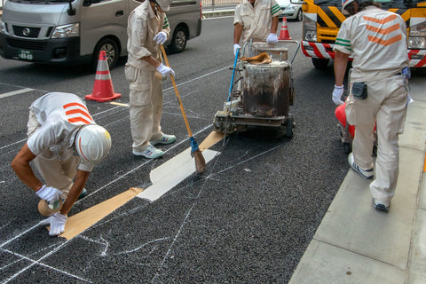 Workers working on a street