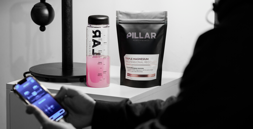 Pillar Triple Magnesium Natural Berry Powder with Micro Shaker and Whoop data on mobile phone
