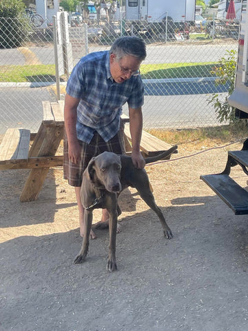 Klaus the Weimaraner and his owner at their RV residence