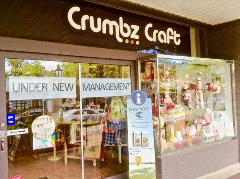 joke signage in crumbs craft's window