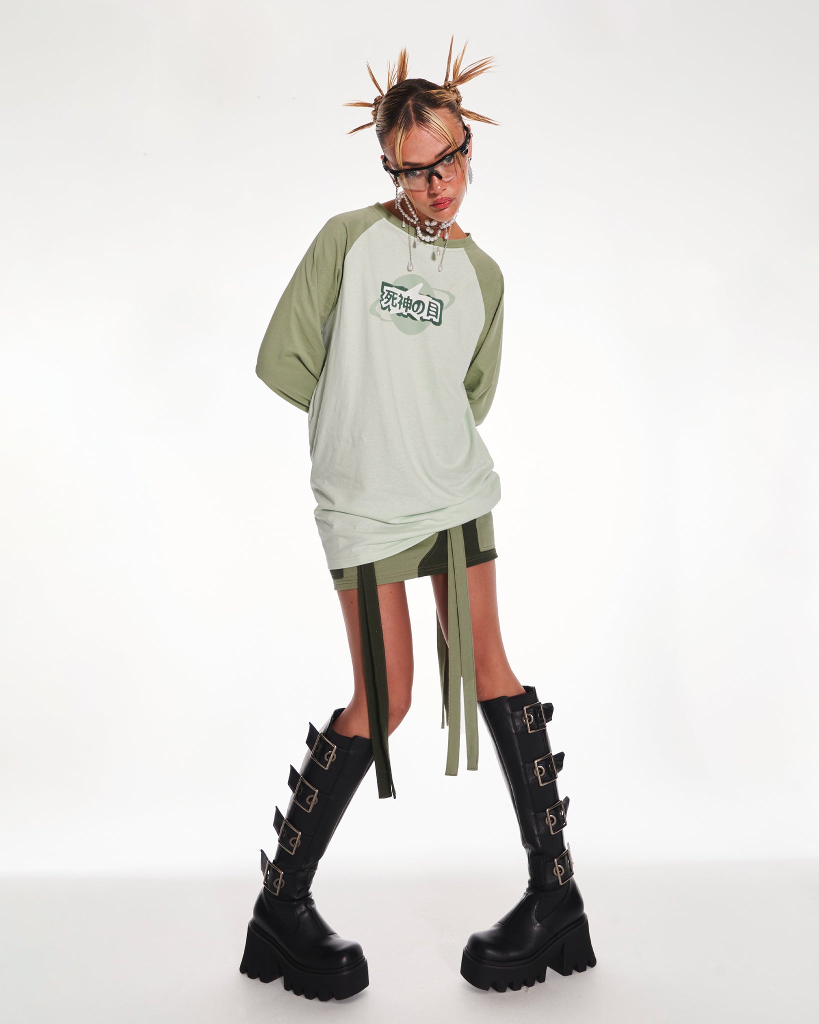 Image of Time Traveler Oversized Raglan Long Sleeve Top With Graphic In Green