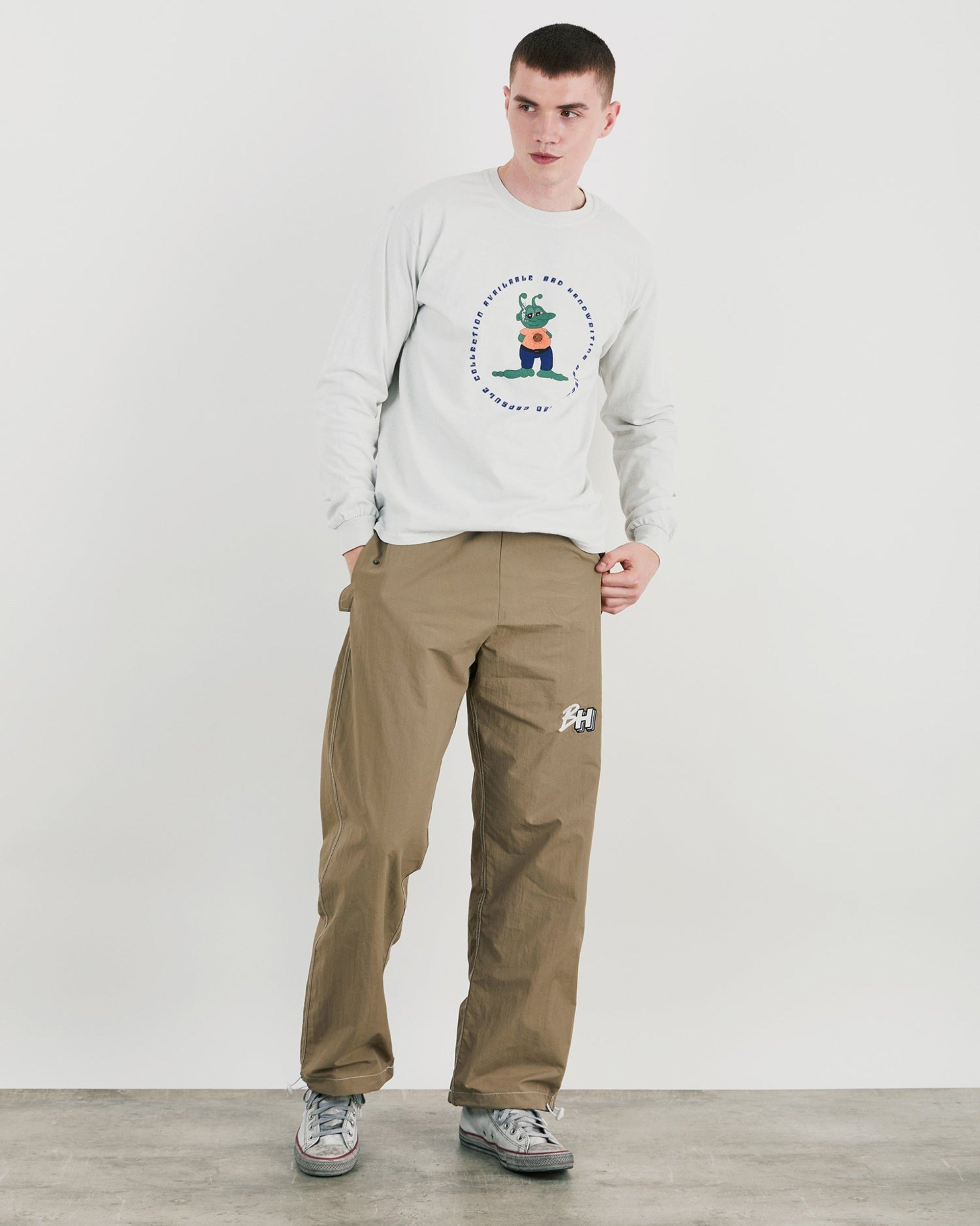 Different Dimension Oversized Long Sleeve Top With Graphic In Off-White