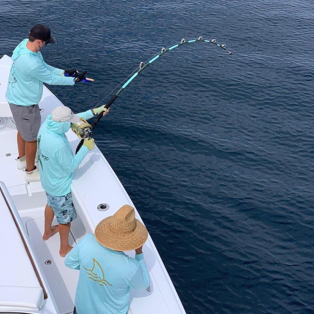 Group of 3 men fishing on boat