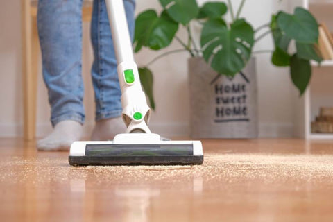 dust floor with vacuum cleaner