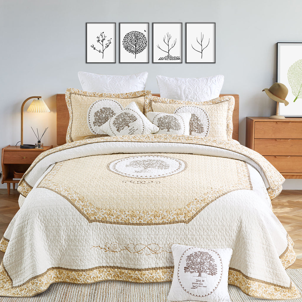 GeeComfy’s handmade embroidered cotton quilt set for queen sized bed