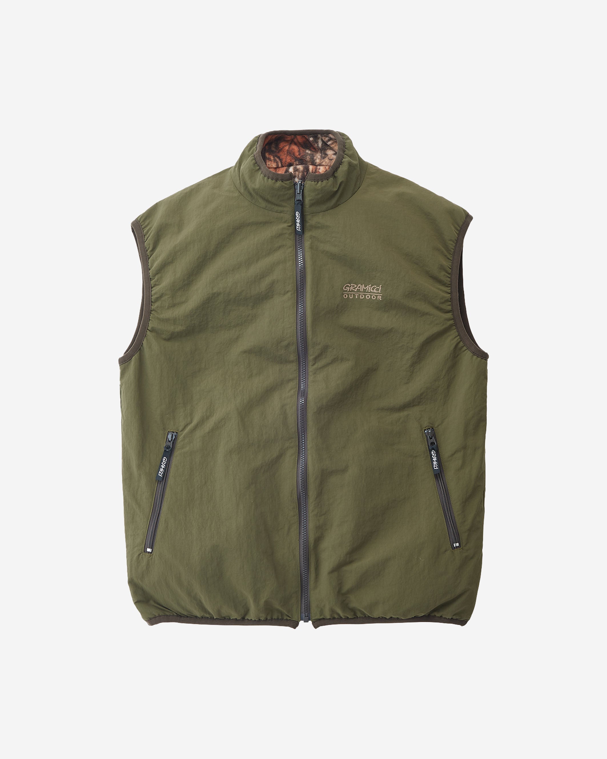The Reversible Fleece Vest boasts exceptional functionality, as it is a durable, wrinkle-resistant vest. This versatile vest utilizes water-repellent nylon and puffy, extra-long-fleece. The spacious silhouette allows this reversible vest to be worn as an excellent outerwear as well as a mid-layer.