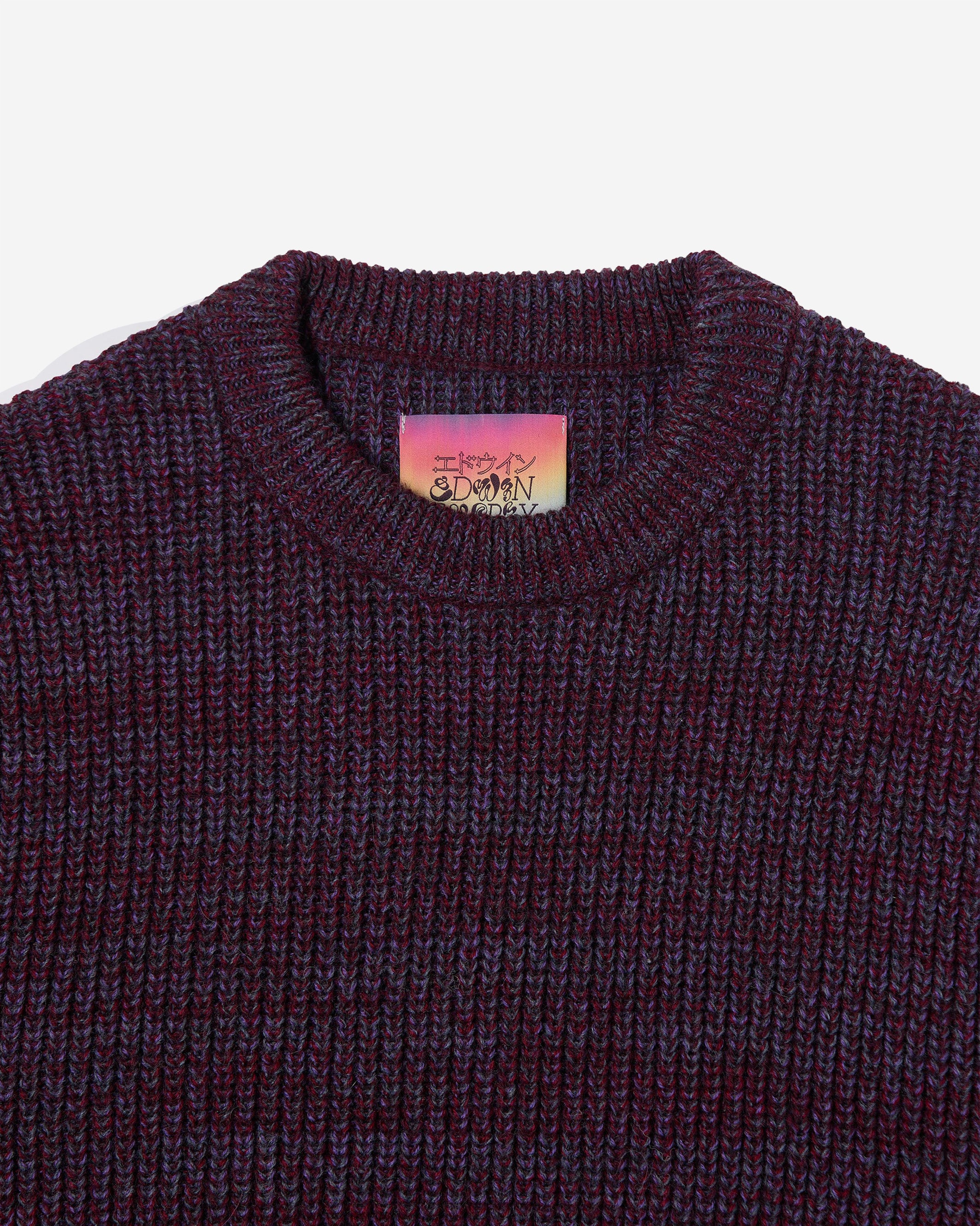 The EDWIN Meander Sweater has an oversized cut and is made from a Wool Mix. 37% Knit Blended Wool |50% Acrylic | 8% Polyamid | 5% Alpaca Oversized Fit Round collar Mixed colored Yarn