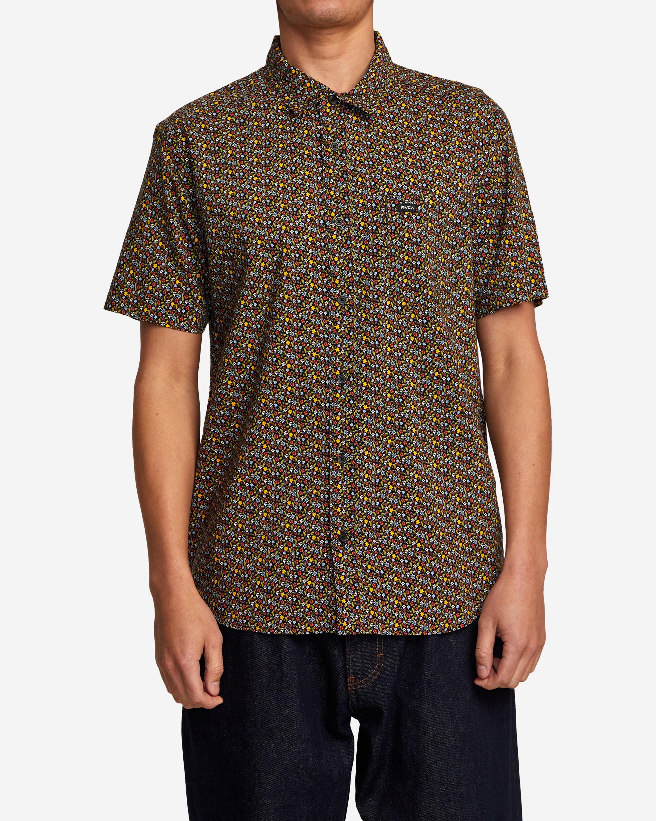 This woven button-down shirt takes a fresh approach to florals with an all-over print on cotton-viscose fabric. The regular fit is styled with a chest pocket and a scalloped hem.