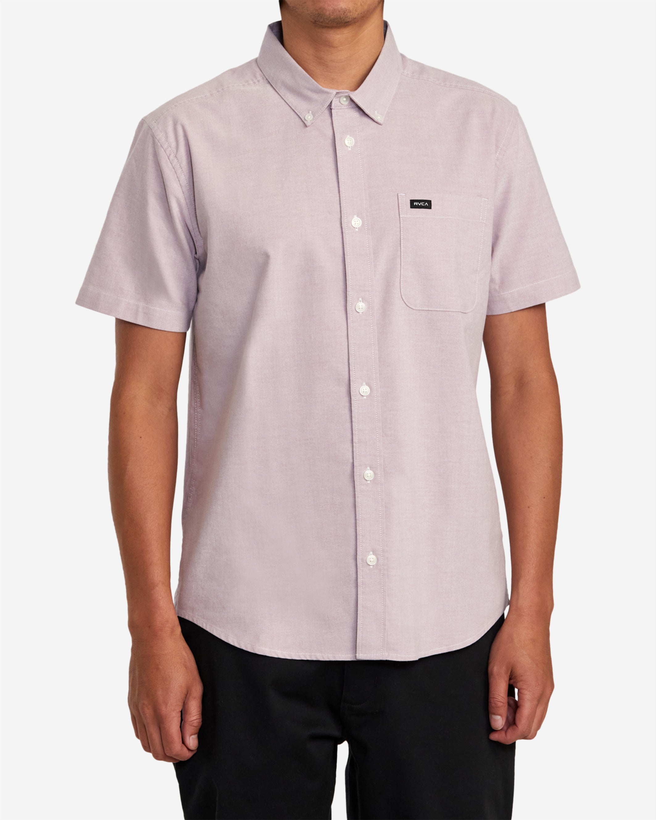 The RVCA That'll Do Stretch Short Sleeve Shirt combines heritage style and modern comfort in one. Made from soft stretch oxford, this button-down shirt features a traditional collar, short sleeves, scalloped hem, chest pocket and woven logo branding.