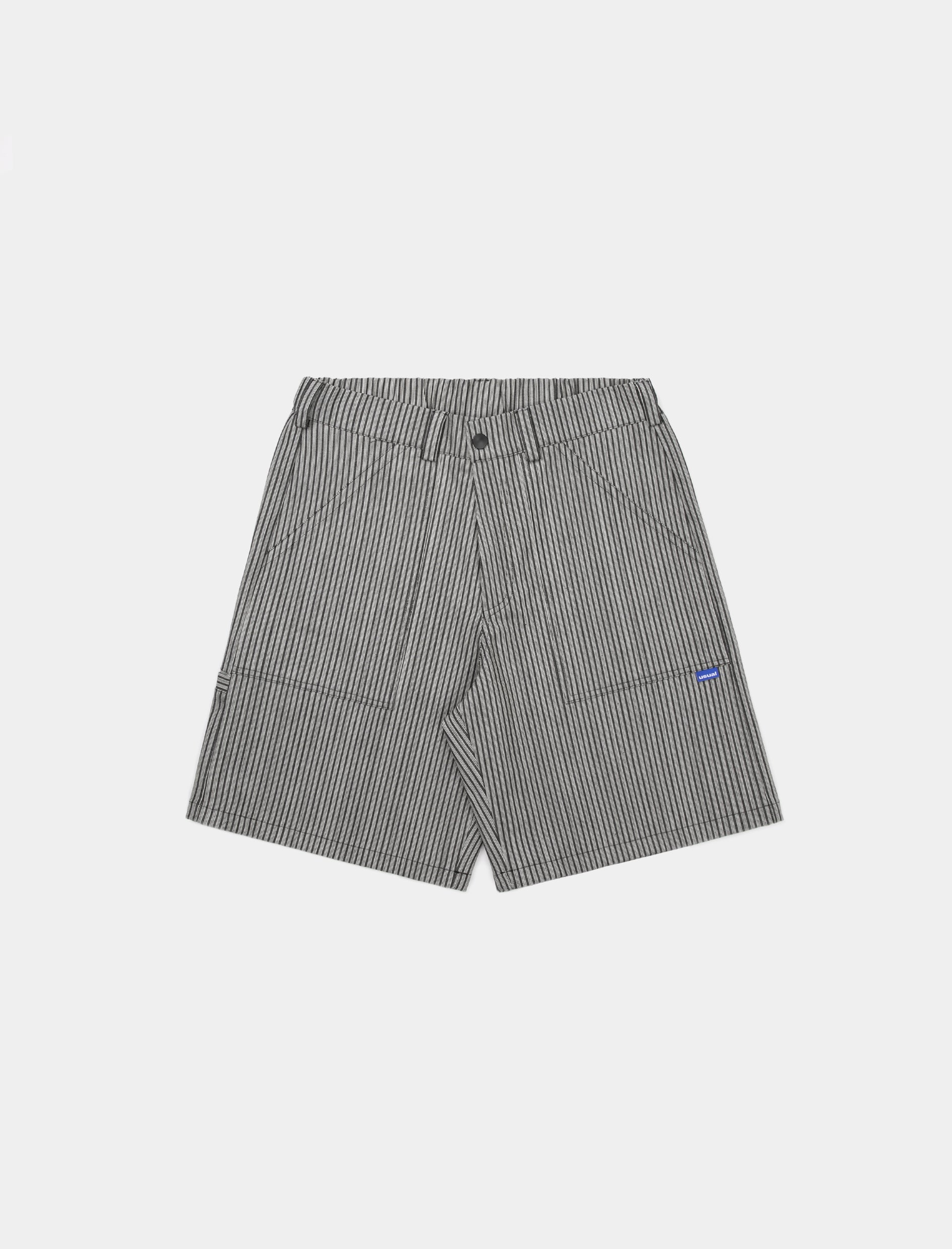 Baggy Fit Short Pants. Low rise. 100% Cotton. Elastic waist on back. Button and zip. Made in Italy.