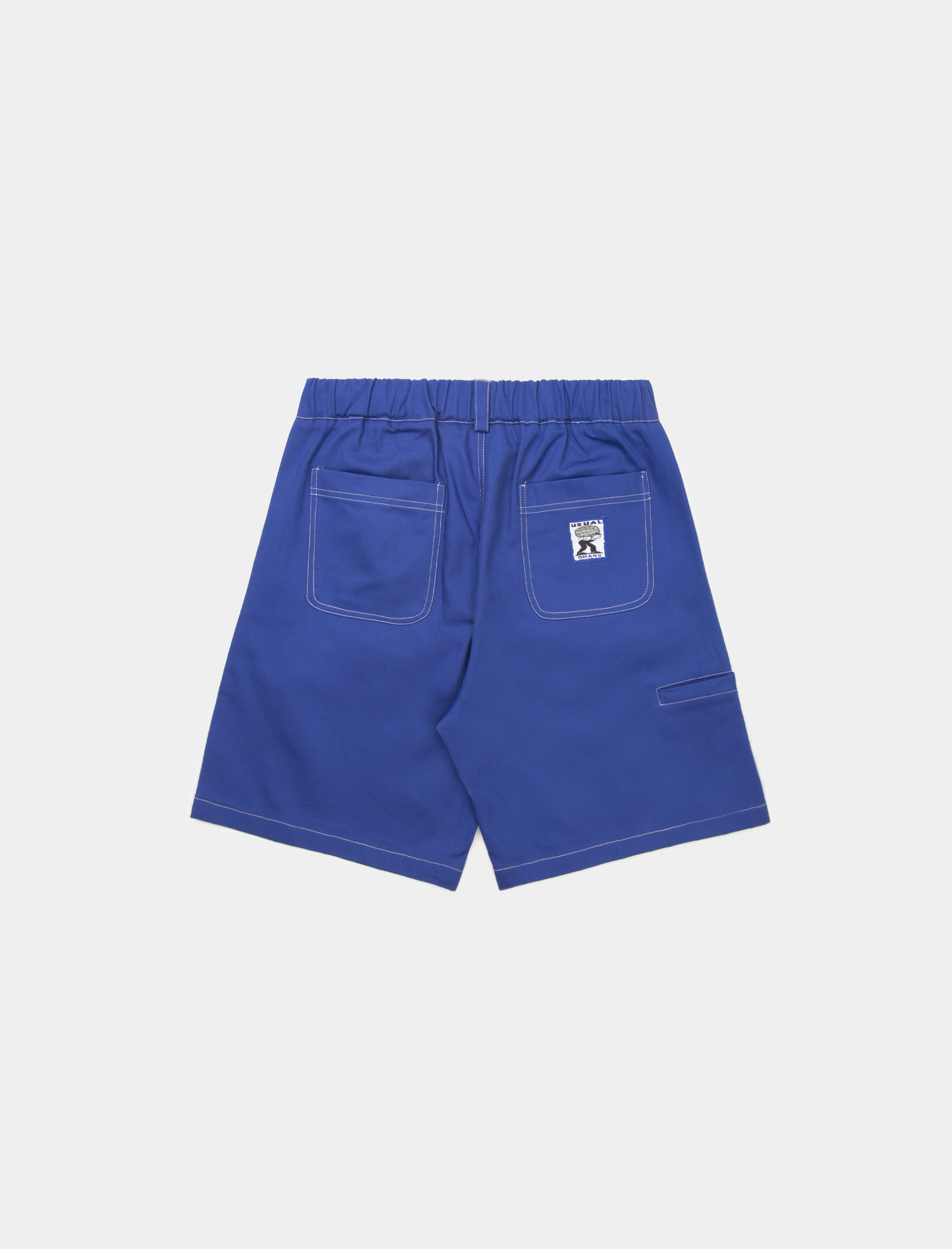 Baggy Fit Short Pants. Low rise. 100% Cotton. Elastic waist on back. Botton and zip. Made in Italy.