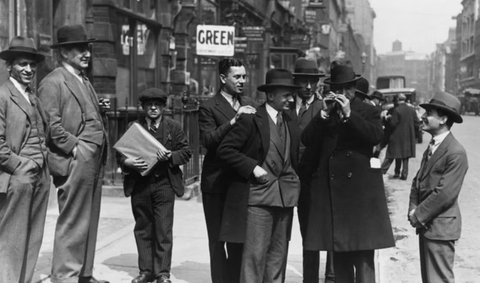 Jewellers examining precious stones in London’s Hatton Garden