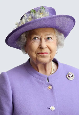 queen elizabeth II platinum jubilee photo of her in a purple outfit