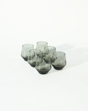 Load image into Gallery viewer, Set of six grey smoked tumbler glasses. Shop the range of hand sourced glassware and ceramics by Rebecca Arts online.
