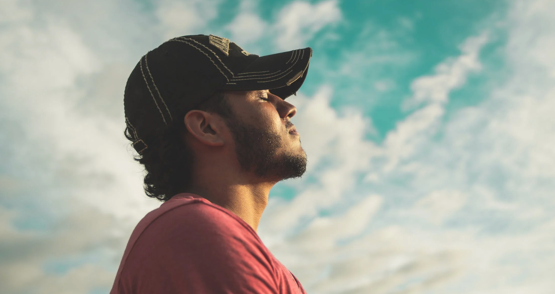 Man breathes outdoors after smoking cessation