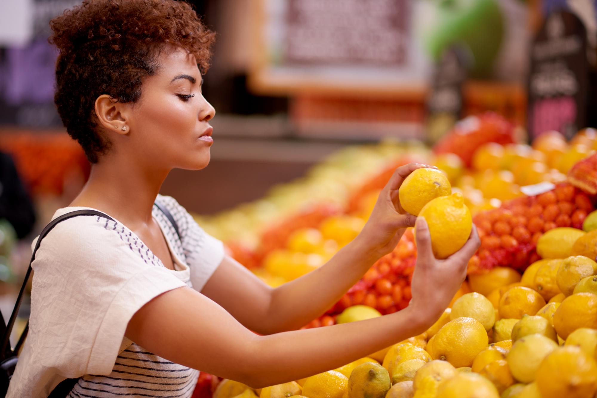 Shot of a young woman shopping in a grocery store