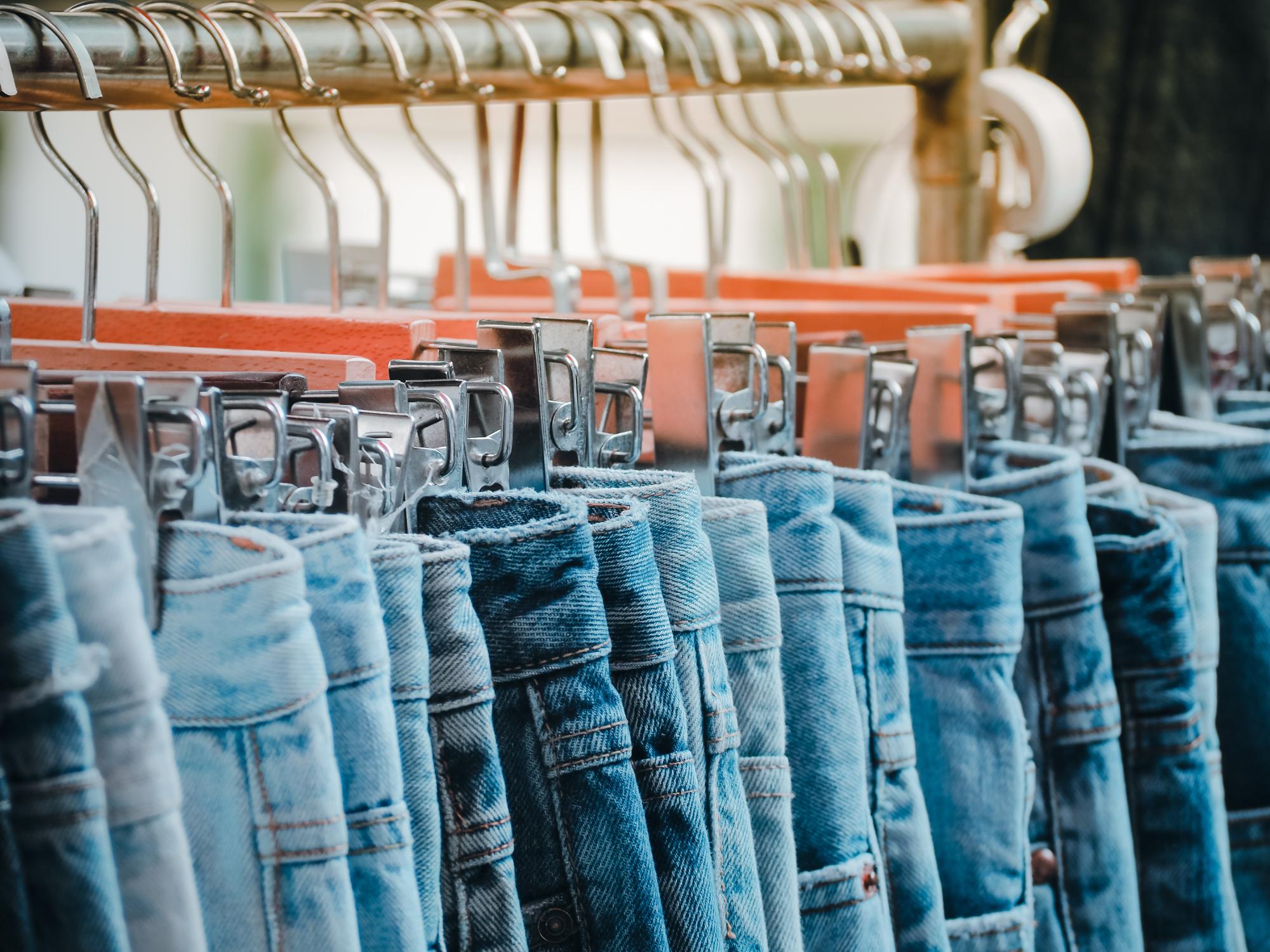 Group of silver-wooden with Jeans of different styles. Fashion concept image