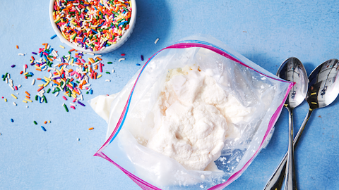 Ice cream in a ziploc bag with funfetti sprinkles next to it