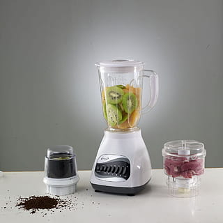 An image of blender with coffee grinder next to it