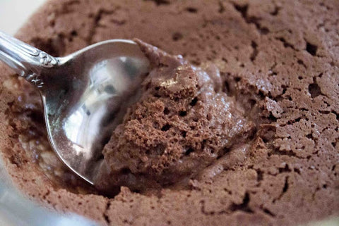 Close up of vegan chocolate ice cream with spoon