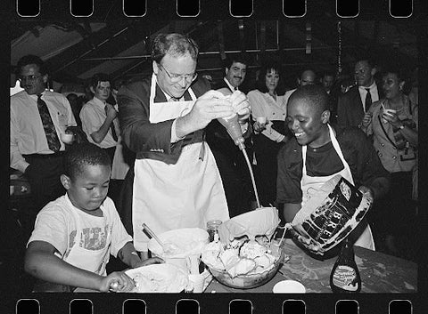 A black and white of ice cream making event with kids