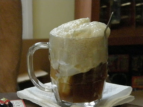 A mug of beer with froth