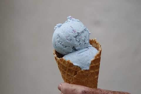 Blue pea ice cream in a cone
