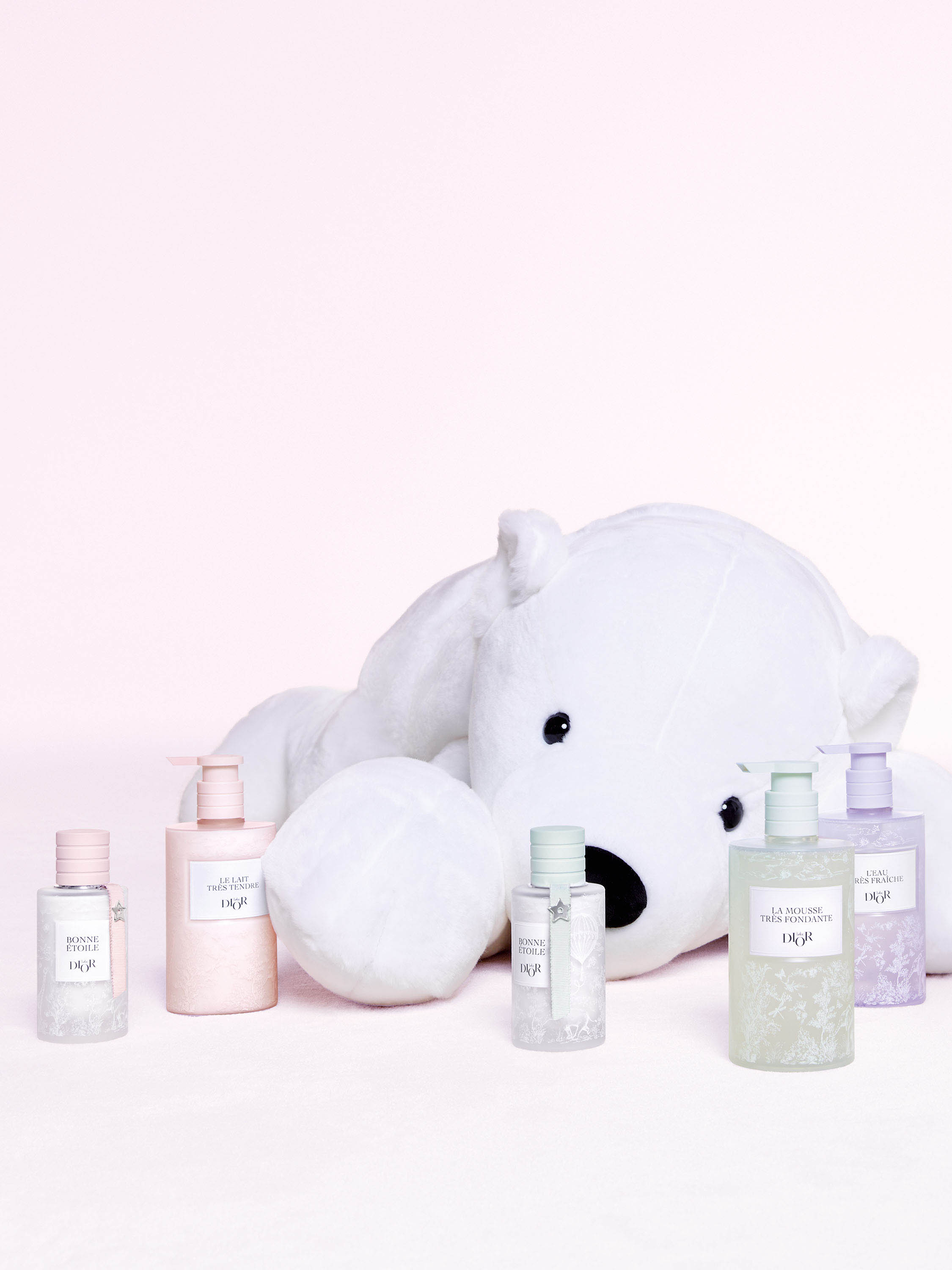 A picture of the white plush behind Baby Dior skincare products and Bonne Étoile eau de senteur.