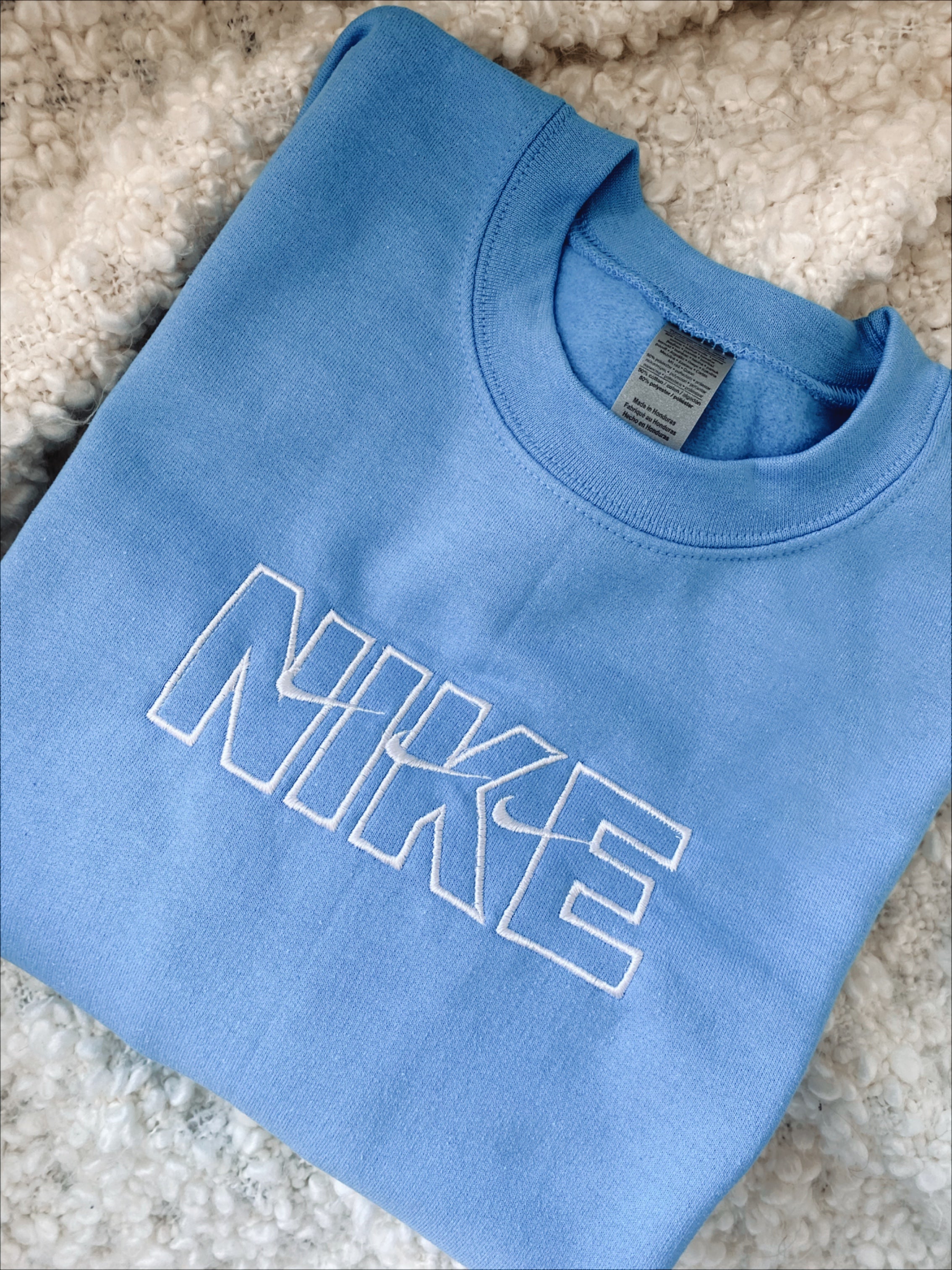 nike triple swoosh sweatshirt