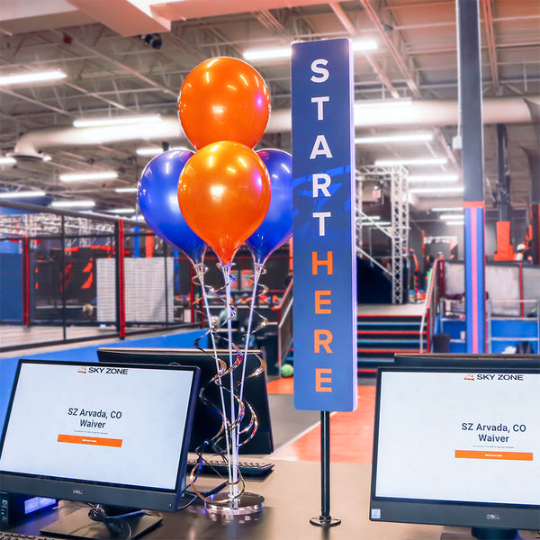 Orange and Blue PermaShine® Balloon Bouquet in Trampoline Park