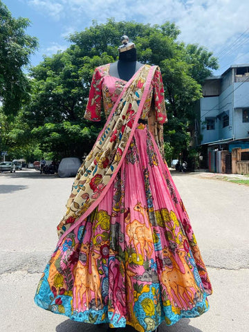 Gorgeous Pink Kalamkari Silk Lehenga with detailed handcrafted designs, combining the soft allure of pink with timeless Kalamkari art, perfect for showcasing refined fashion taste