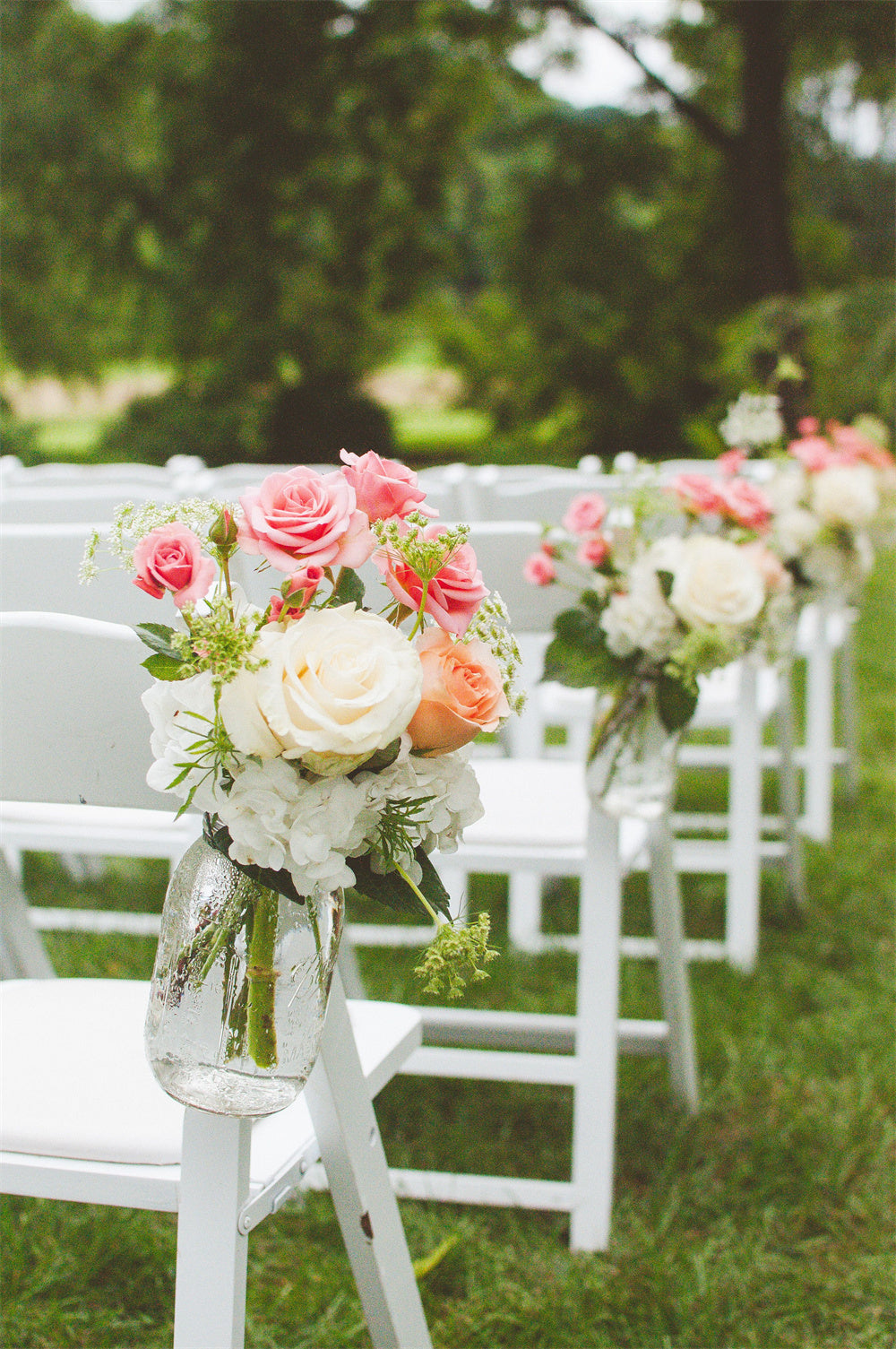 Amazing Wedding Aisle Decorations with Coral Flowers