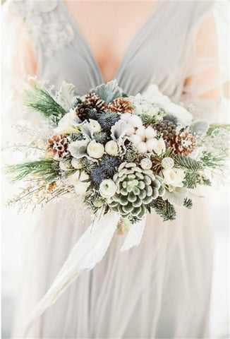 Pinecone and cotton winter wedding bouquets