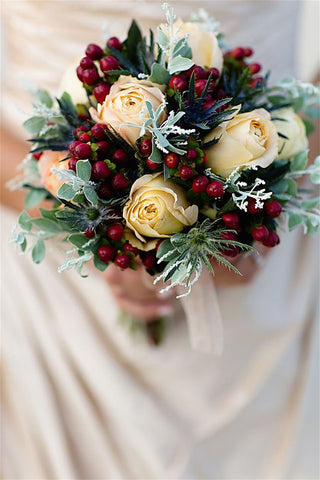 Champagne roses and snowberry for winter wedding bouquets