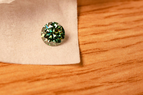 Emerald stone on a cloth