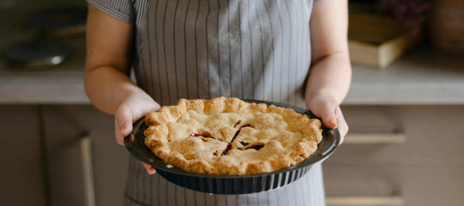 Person holding pie