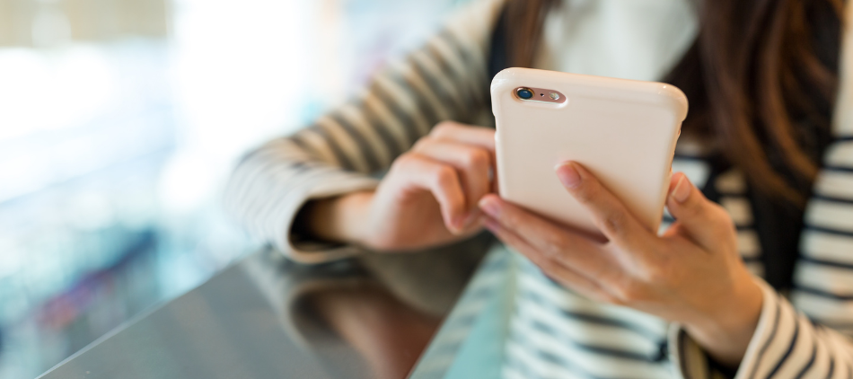 Closeup of person holding smartphone