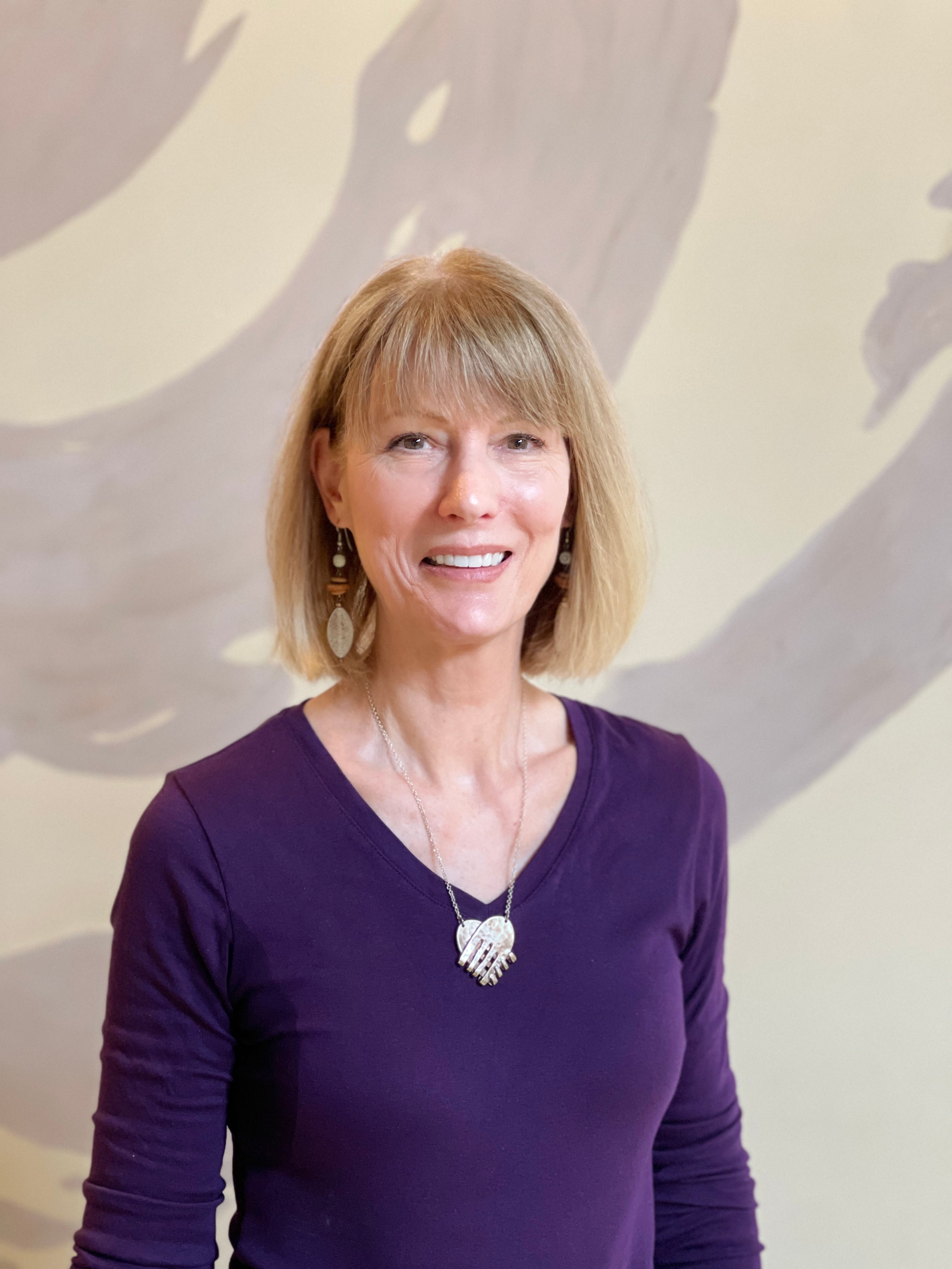 Headshot of Elizabeth Lewis in YogaOne Studio