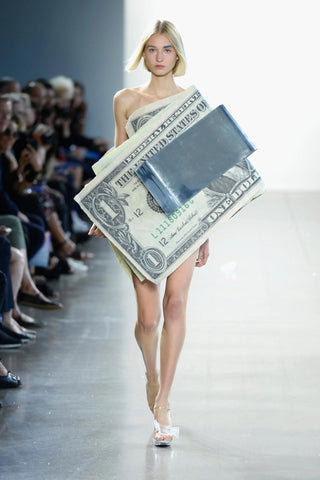 Runway model in Kota Okuda money dress via Monica Feudi/Getty Images