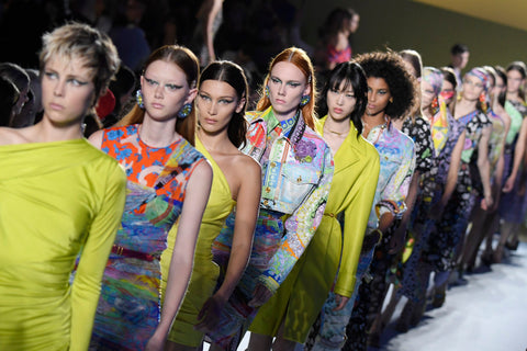 Models at Fashion Week for Versace Spring 2019 via Victor Boyko/Getty Images
