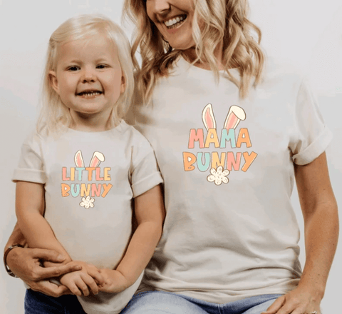 A mom and daughter with matching Easter shirts.