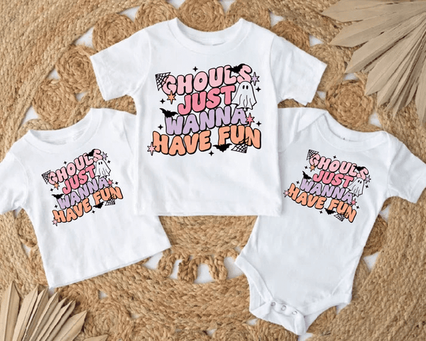 Matching tees with colorful letterings that say "Ghoulds just wanna have fun."