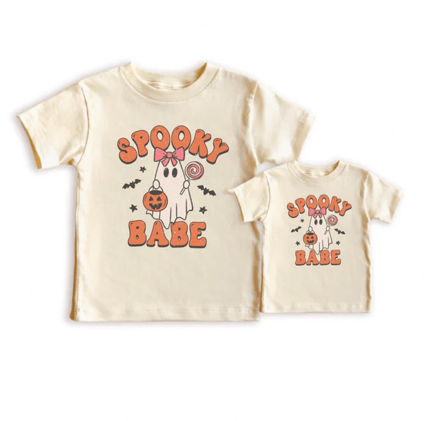 Natural-colored tees with a ghost graphic and the words "Spooky Babe" in orange.