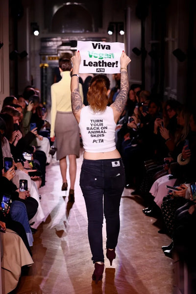 Victoria Beckham Faces PETA Protesters at Paris Fashion Week