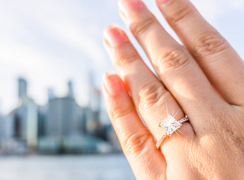 Sparkling lab grown princess cut solitaire with nyc skyline