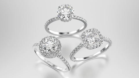 3D illustration of three different white gold or silver diamond rings