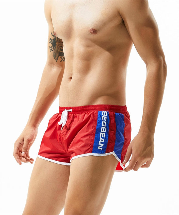 Pride Stripe Swim Trunks – Queer In The World: The Shop