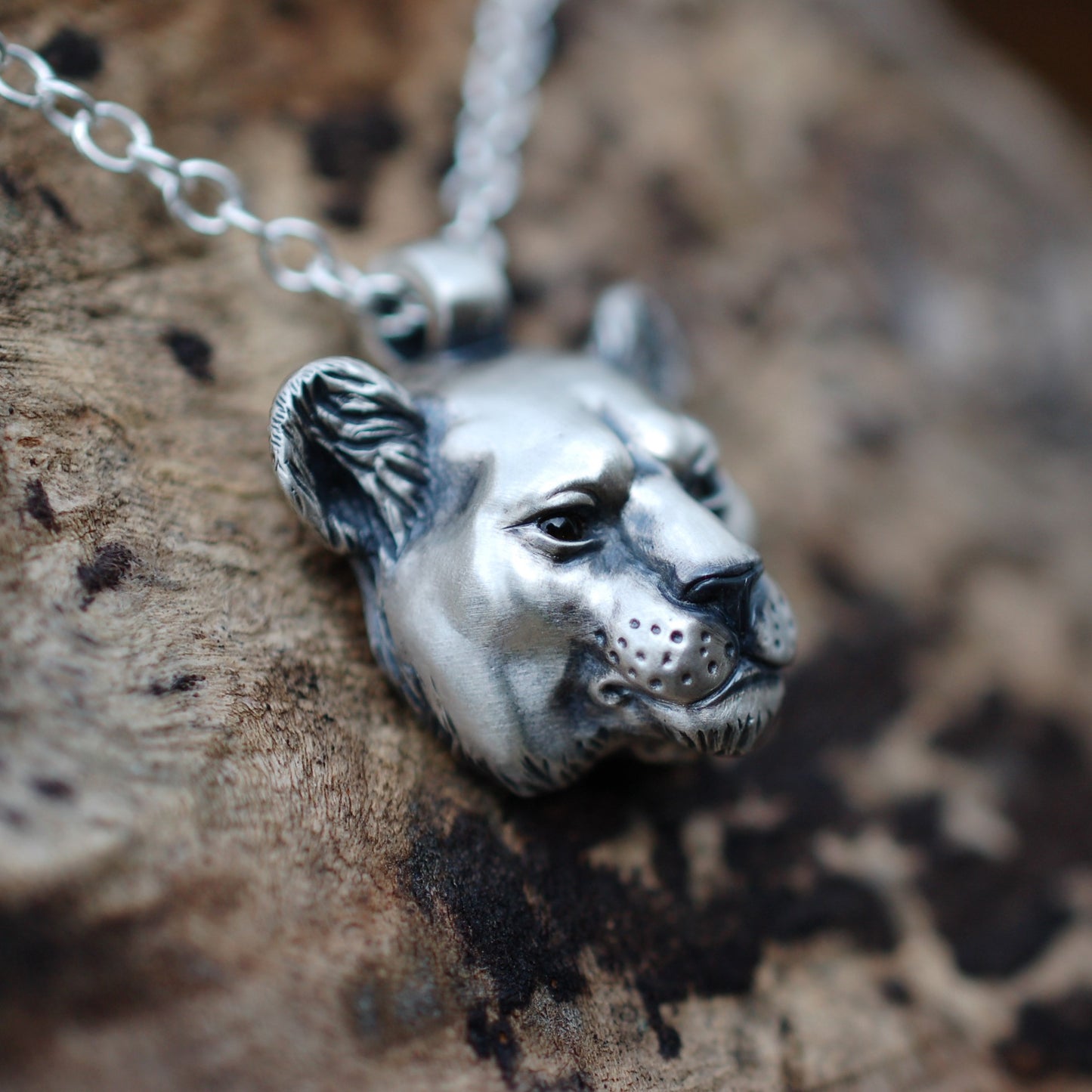 Silver lioness necklace. Lioness head pendant and solid silver chain with citrine eyes. *This piece is finished and ready to be shipped* © Adrian Ashley