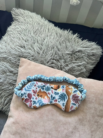 sleepmask on cushion by bed