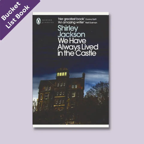 An image of the cover of We Have Always Lived In The Castle by Shirley Jackson, the featured literary classic choice for the June Paperback Down Book and Gift Subscription Box.
